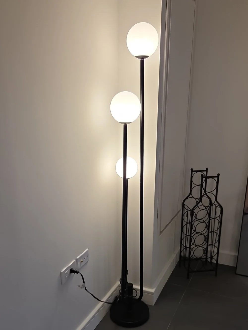 Black Triple-Globe Floor Lamp with White Glass Shades